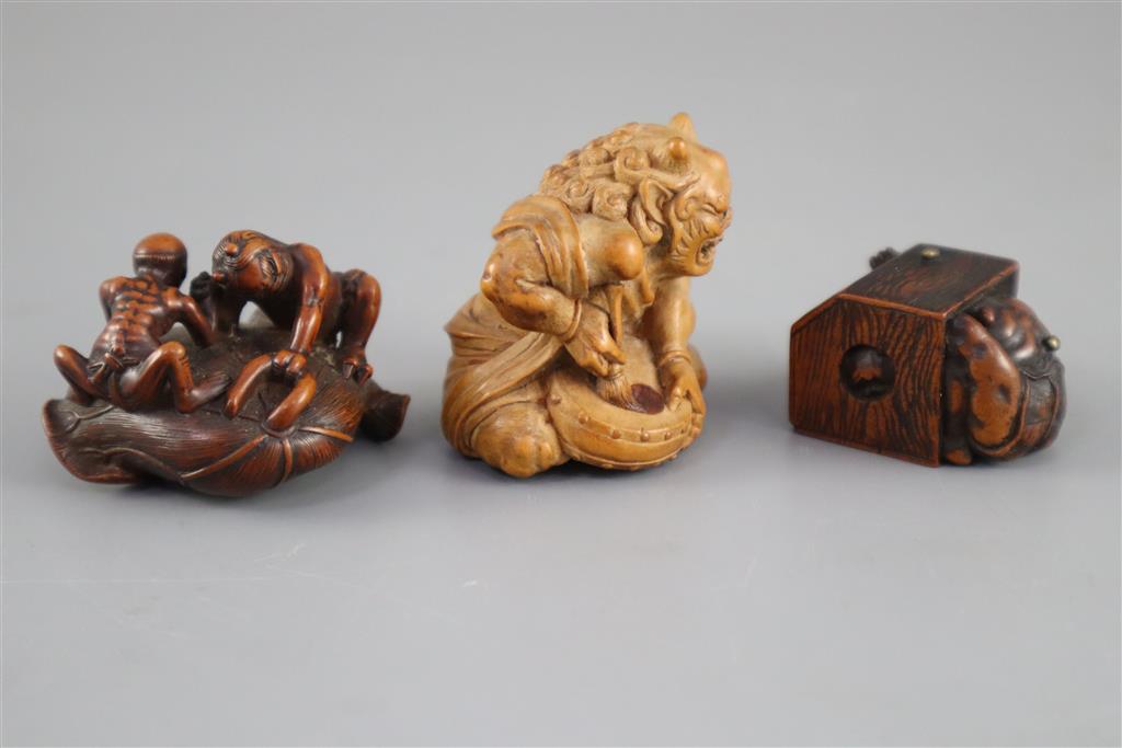 Three Japanese boxwood or cherry netsuke of oni, Meiji period,